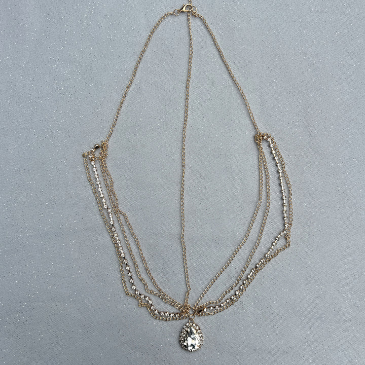Hair jewellery accessory, gold tone layered chains, teardrop crystal pendant with diamante border, elegant decorative headpiece, boho festival inspired style, sparkling statement hair accessory, chic stylish gift for her
