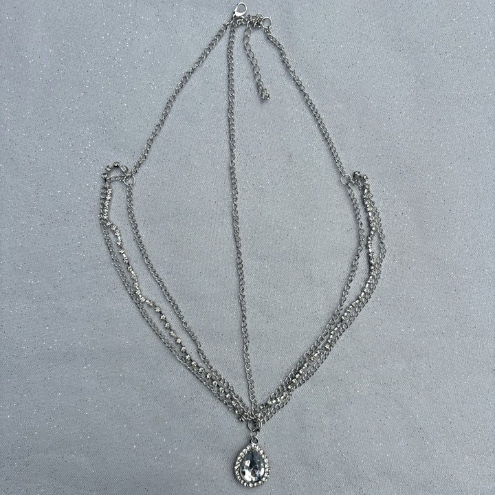 Hair jewellery accessory, silver tone layered chains, teardrop crystal pendant with diamante border, elegant decorative headpiece, bohemian festival inspired style, sparkling statement hair accessory, chic stylish gift for her