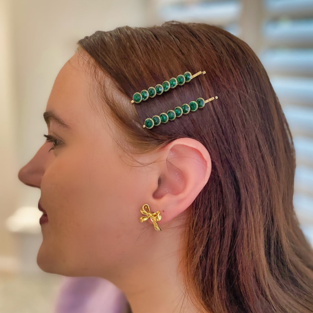 Green hair slides, gold tone grips, round green crystal embellishments, slim bar design, sparkling decorative hairpins, vintage inspired style, elegant hair accessory set, gift for her