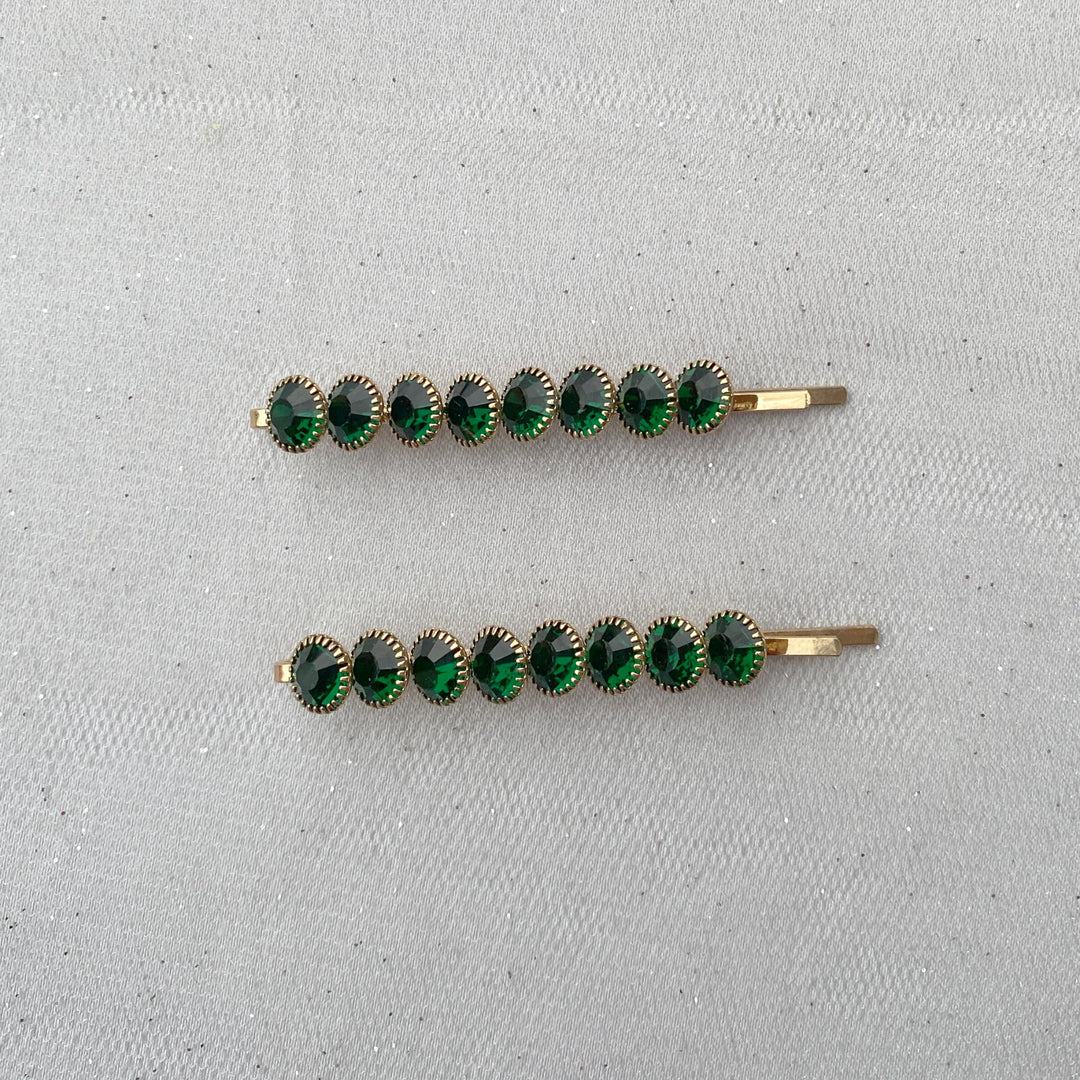 Green hair slides, gold tone grips, round green crystal embellishments, slim bar design, sparkling decorative hairpins, vintage inspired style, elegant hair accessory set, gift for her