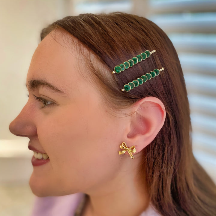 Green hair slides, gold tone grips, round green crystal embellishments, slim bar design, sparkling decorative hairpins, vintage inspired style, elegant hair accessory set, gift for her