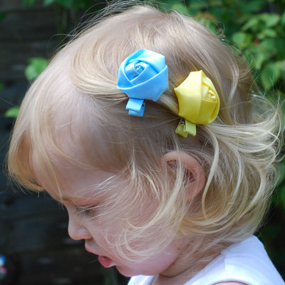 girls flower hair clips blue and yellow