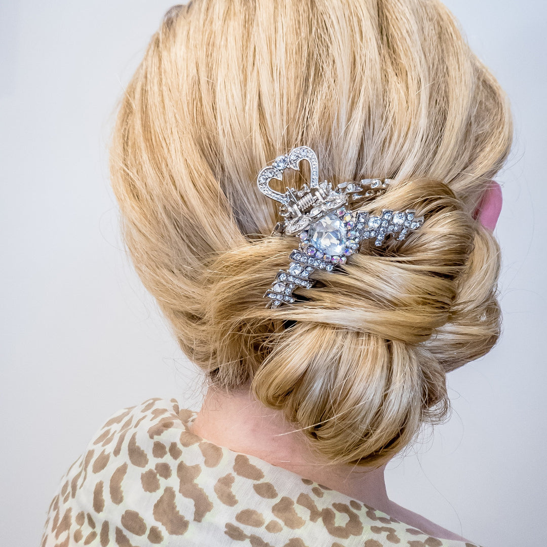 silver claw hair clip worn with bun updo