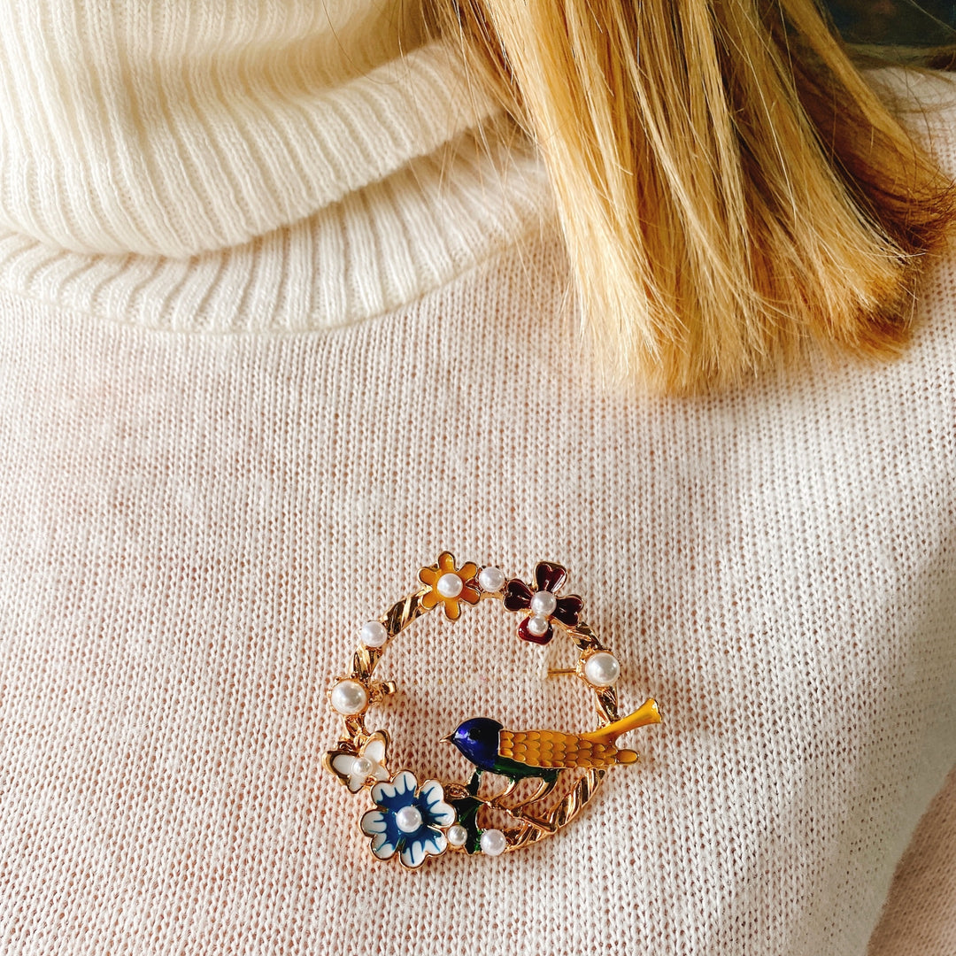 vintage brooch with bird in colourful enamel