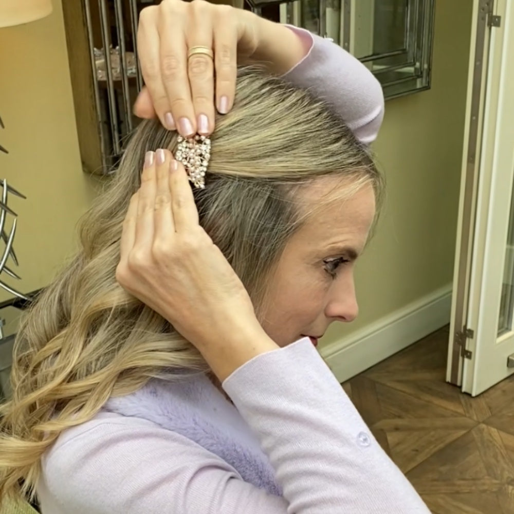 Using a small hair grip underneath a lsmall pearl barrette to prevent sliding in fine hair