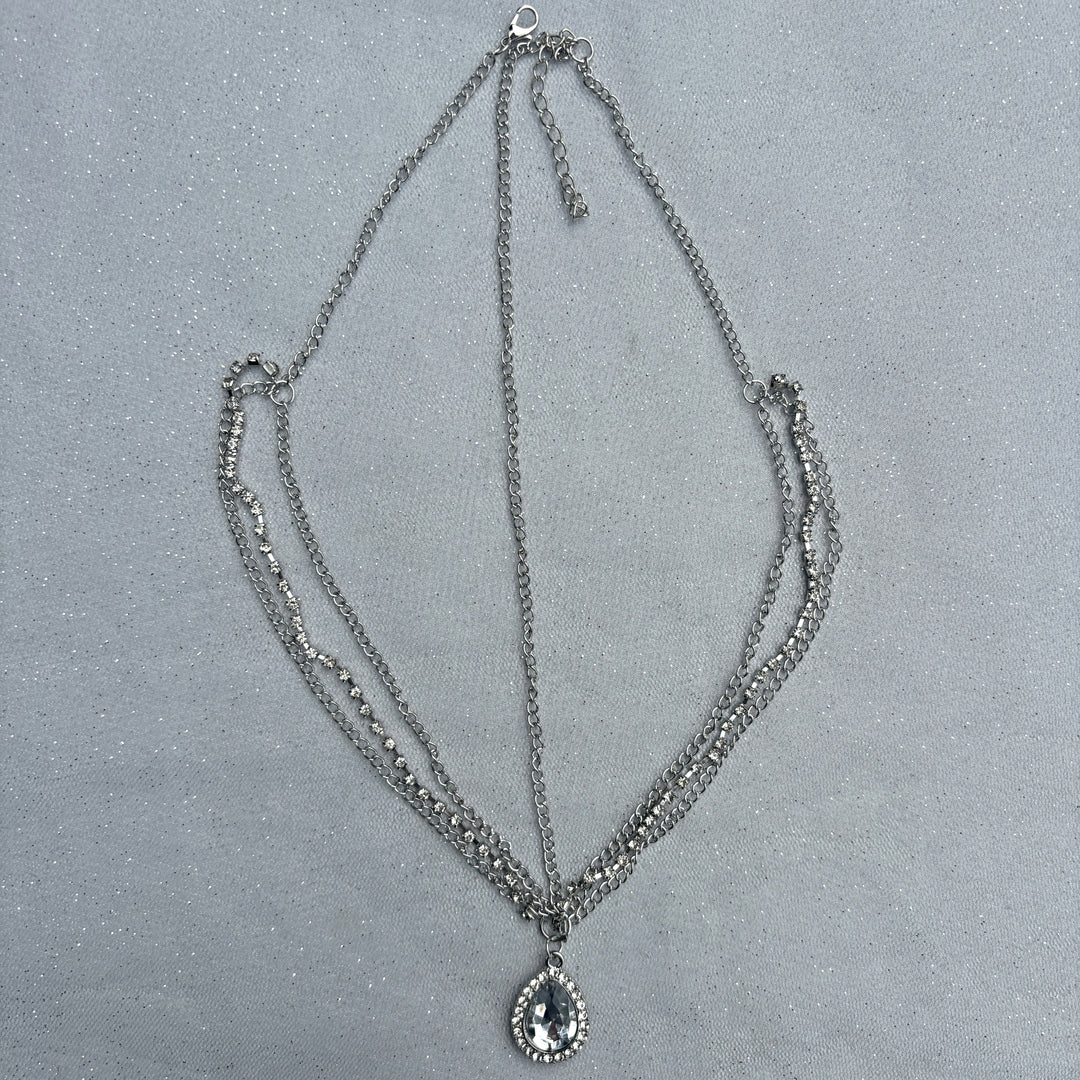 Hair jewellery accessory, silver tone layered chains, teardrop crystal pendant with diamante border, elegant decorative headpiece, bohemian festival inspired style, sparkling statement hair accessory, chic stylish gift for her
