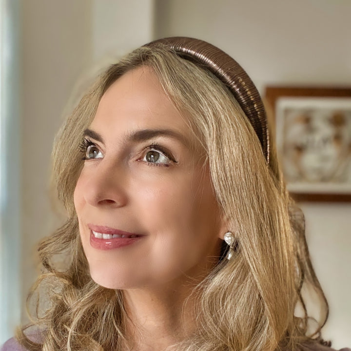 Bronze metallic padded headband with ribbed shimmer fabric.