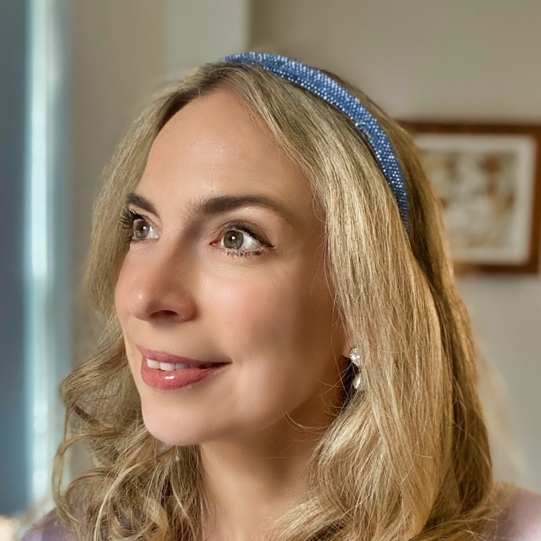 Light blue sparkly headband covered in uniform glittering crystals.