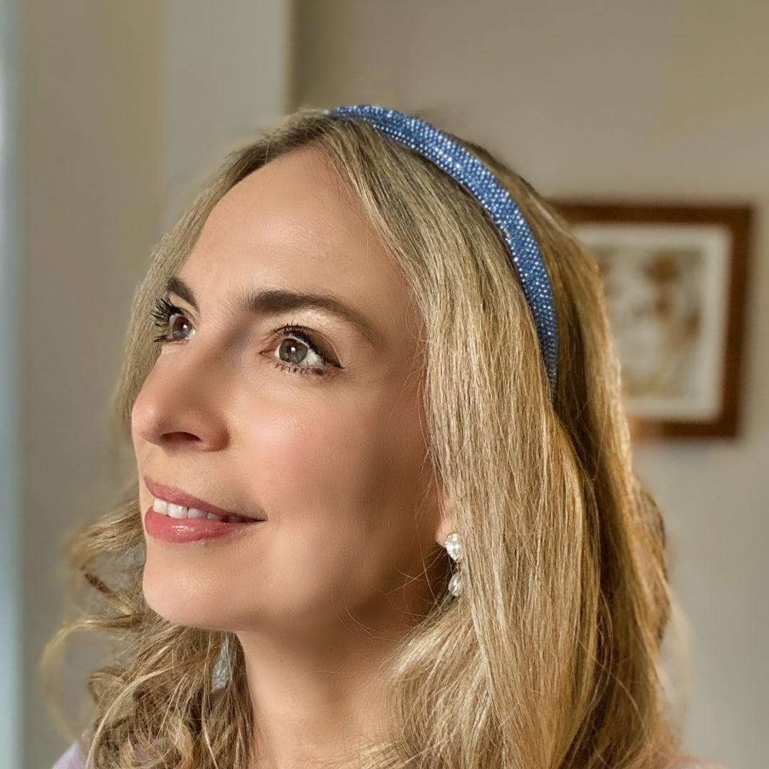 Light blue sparkly headband covered in uniform glittering crystals.