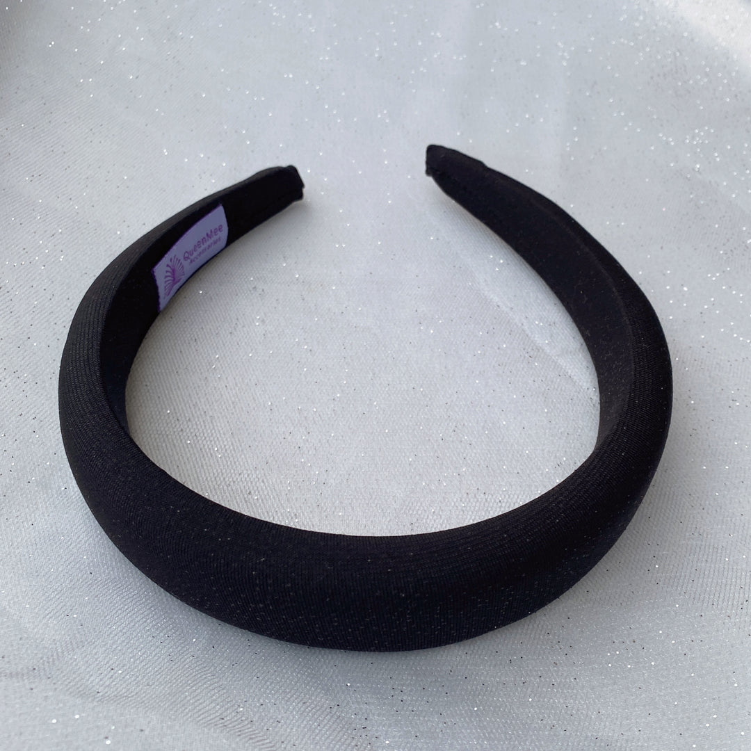 Black sparkly padded headband with subtle shimmer detailing