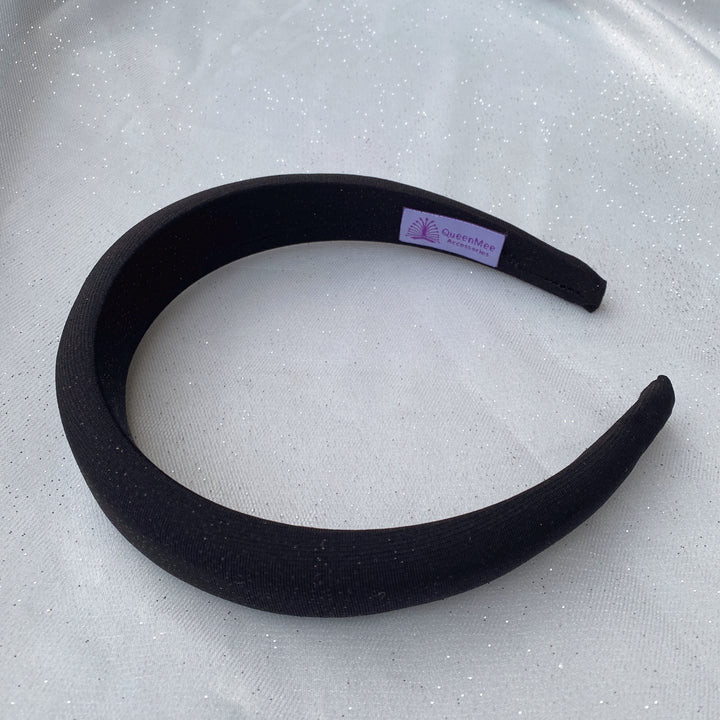 Black sparkly padded headband with subtle shimmer detailing