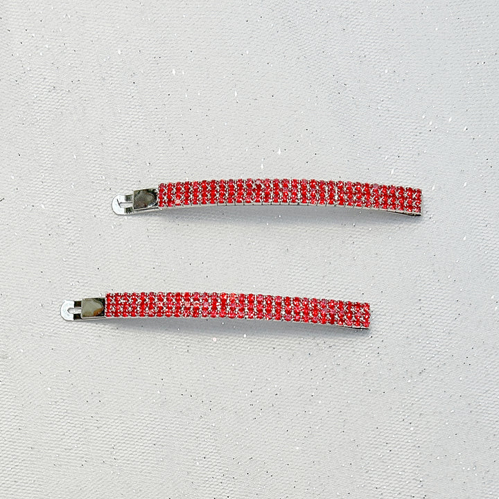 Red crystal diamanté hair slides with silver-tone finish.