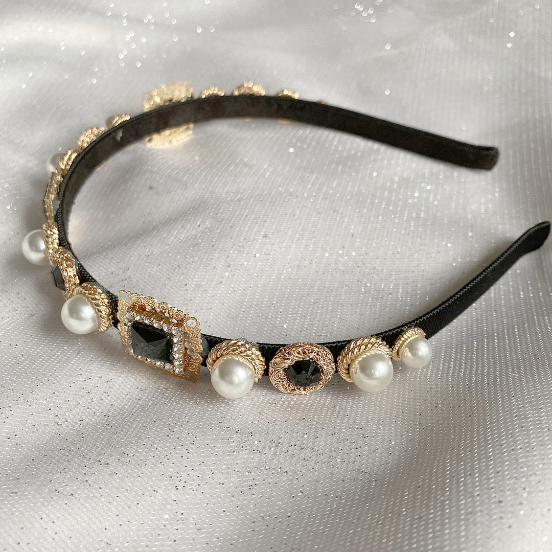 black headband with pearls in gold alice band