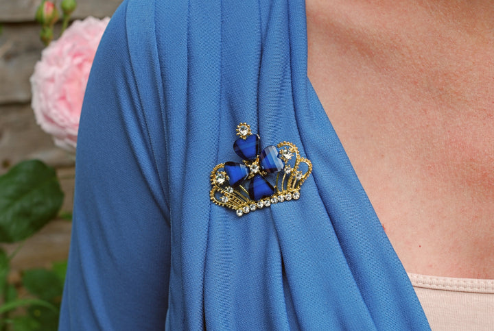 blue brooch with rhinestone styled