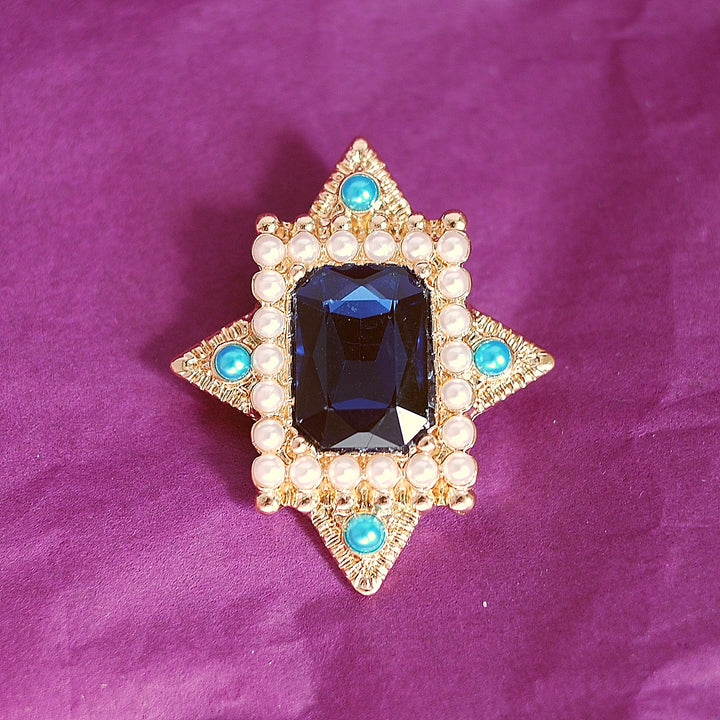 blue vintage brooch with pearls