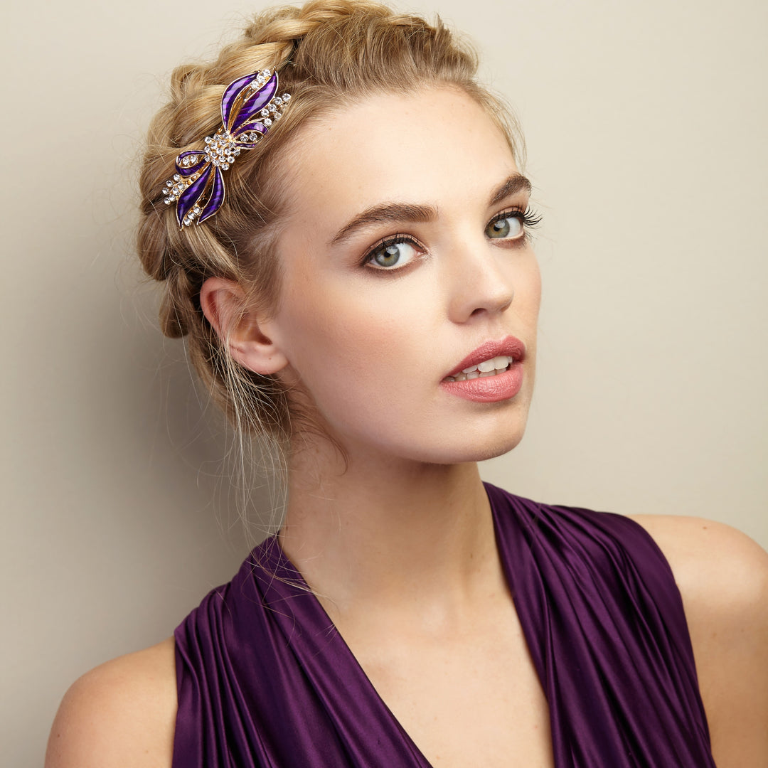 bow hair clip in purple updo hairstyle