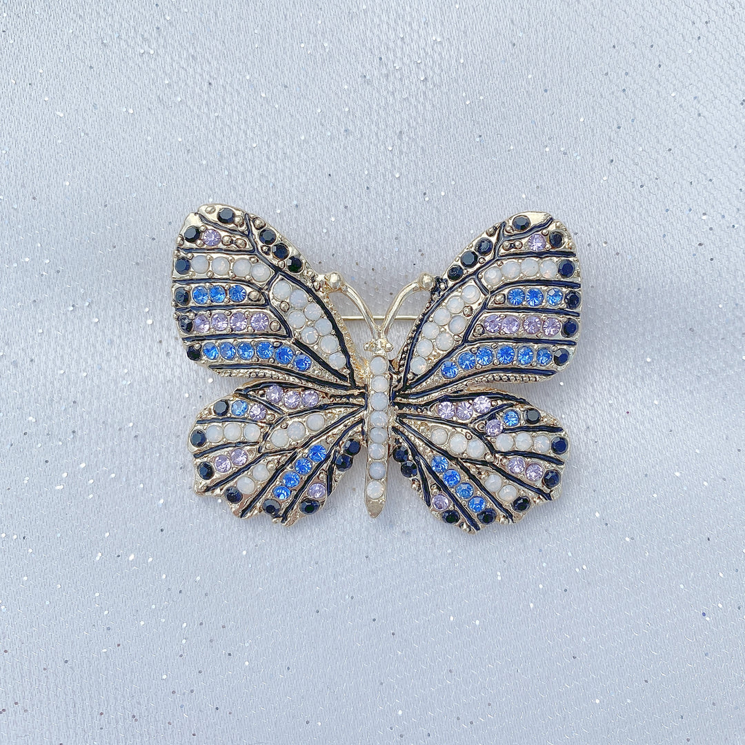 butterfly brooch in blue and lilac crystal