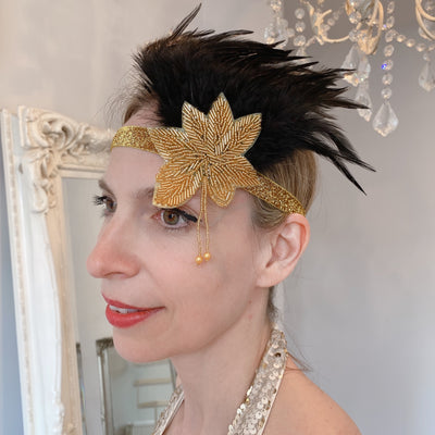 feather headpiece in gold with beading and hair up