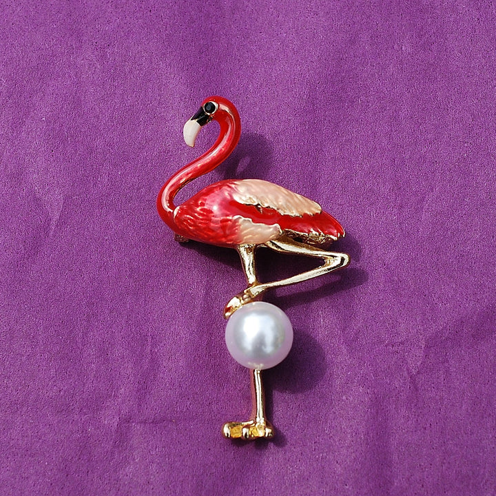 flamingo brooch in enamel with a pearl and gold trim