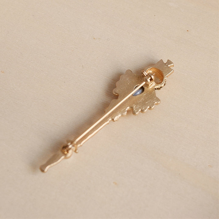 gold crown brooch back