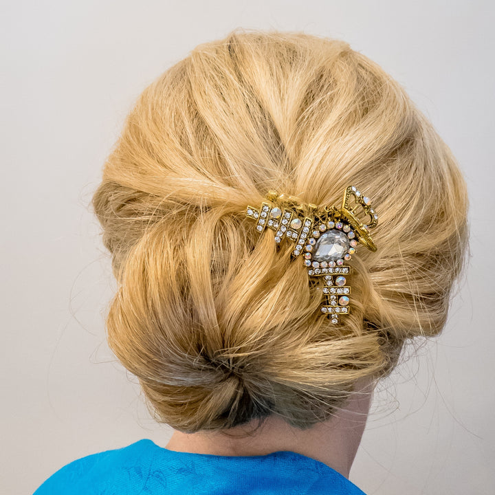 gold hair clamp bun updo