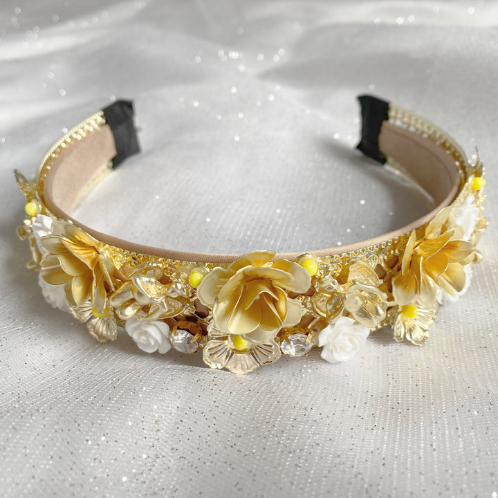 gold headpiece with flowers