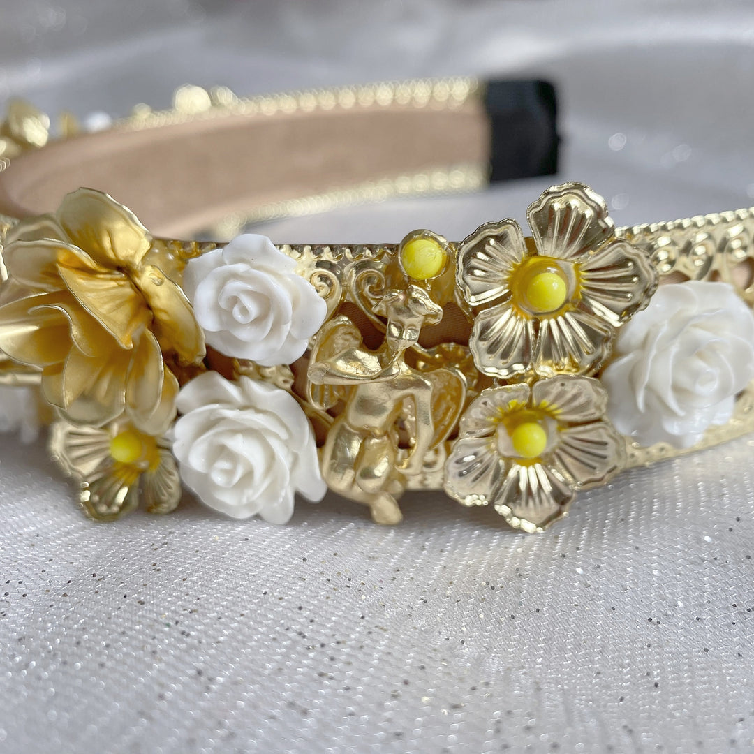 gold headpiece with ivory flowers