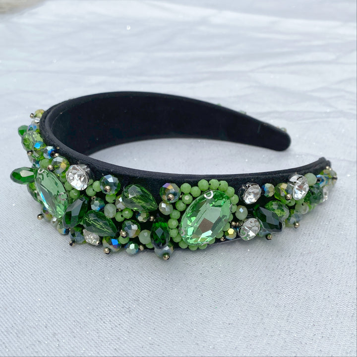 green headband jewelled with crystal