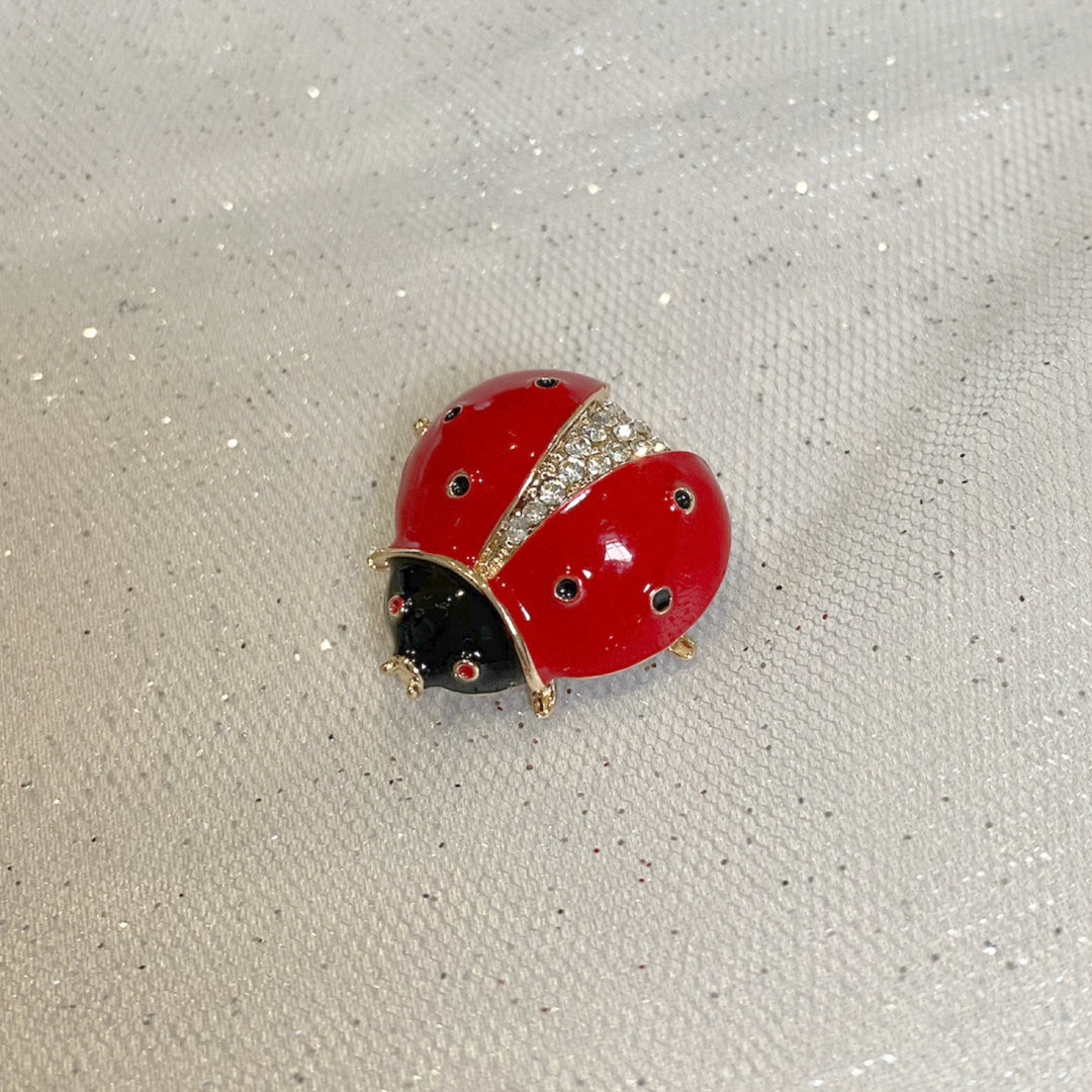 ladybird brooch in enamel