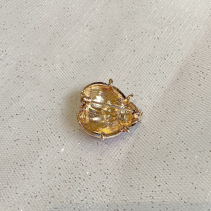 ladybird brooch gold back