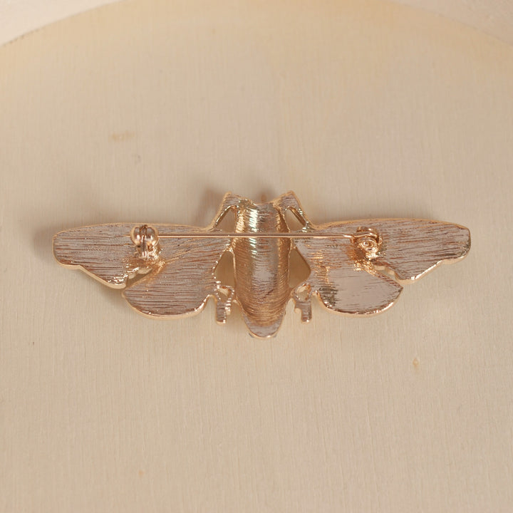 moth brooch gold back