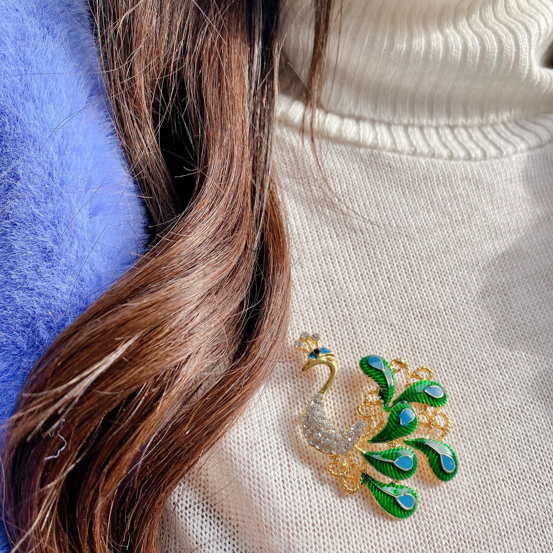 peacock brooch in enamel and crystal