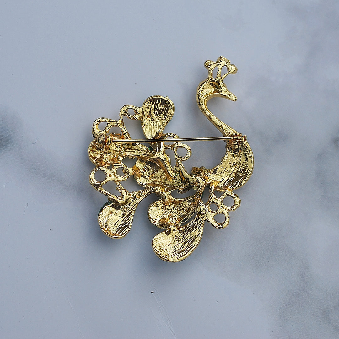 peacock brooch in gold back