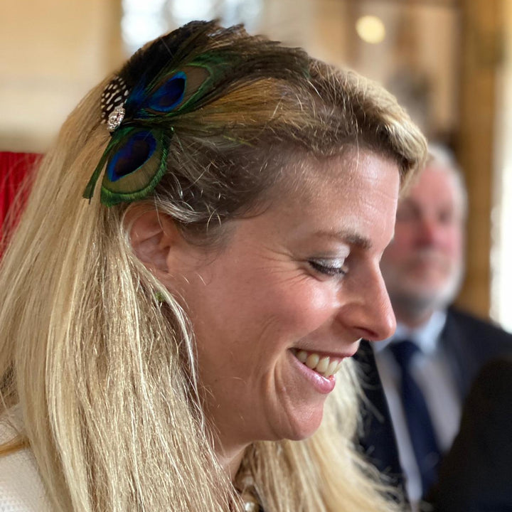 peacock feather fascinator wedding guest