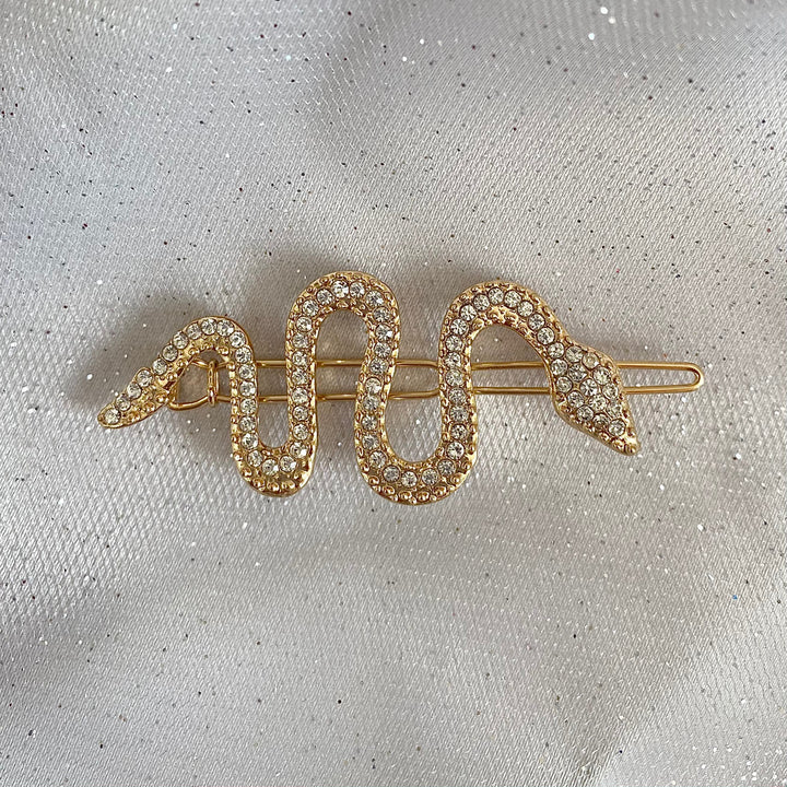 snake hair accessory in gold