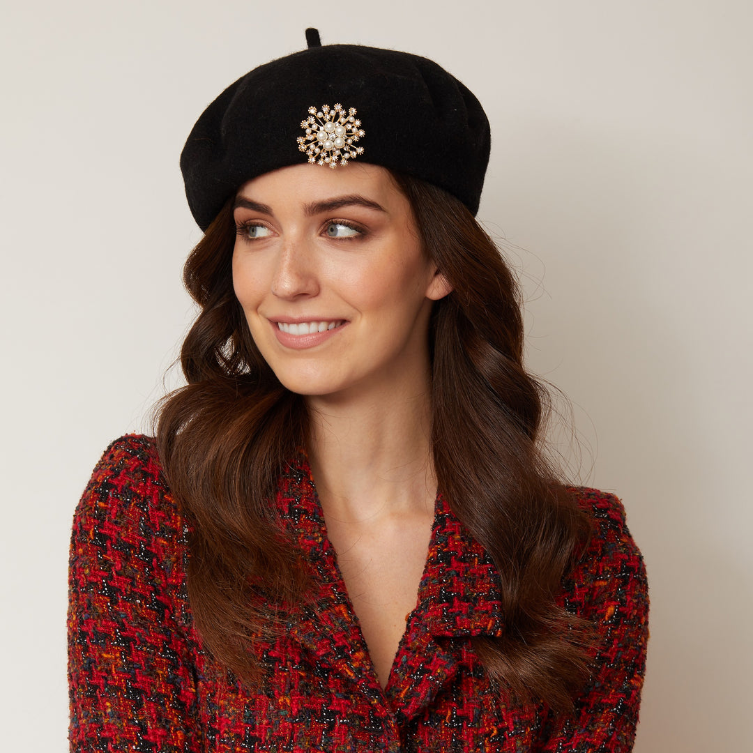 vintage hat with pearl brooch for winter wedding